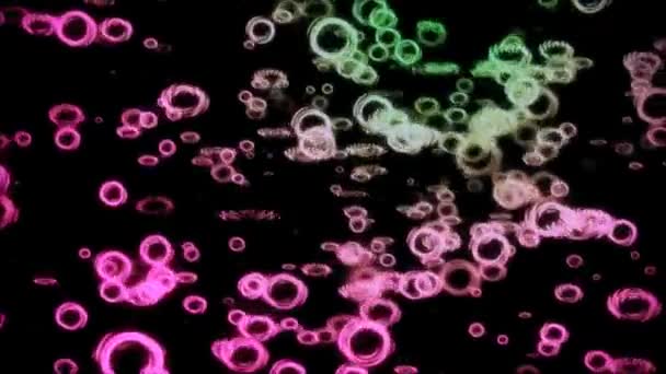 Círculos multicolores abstractos sobre fondo en negro
 - Metraje, vídeo