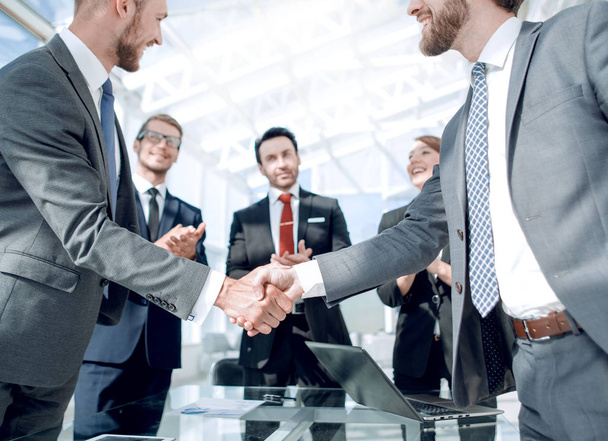 handshake business partners standing in the office - Fotó, kép