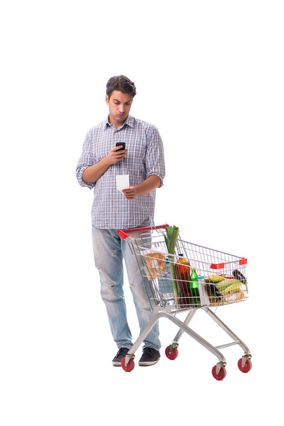 Young man with supermarket cart trolley on white - 写真・画像