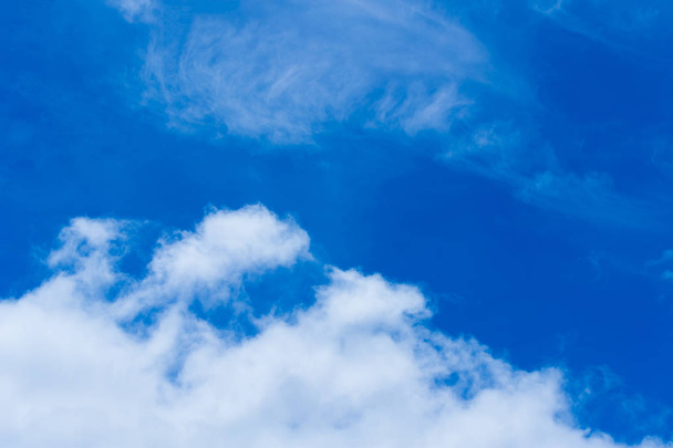  Warm blue sky, white cloud and sun. - Photo, Image
