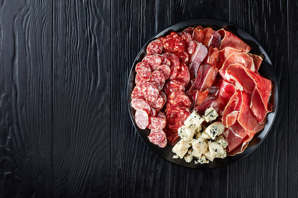 cheese, sausages, dry aged pork meat, top view - Foto, Imagem