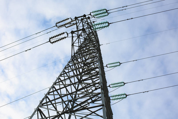A high voltage tower is under the blue sky - Photo, Image