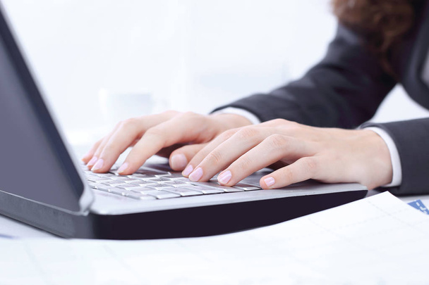 Woman working at home office hand on keyboard close up - Φωτογραφία, εικόνα
