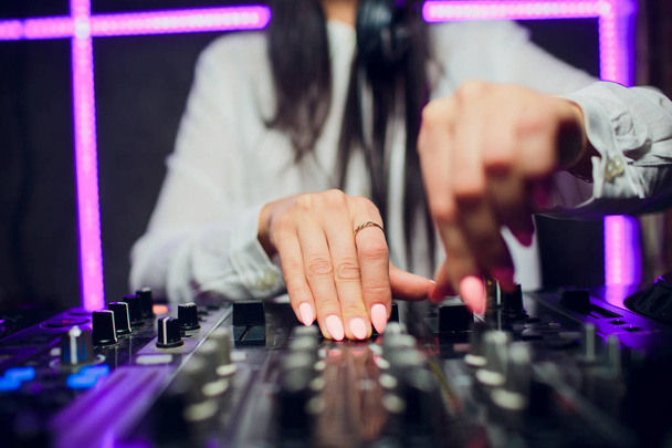 DJ playing music mixer closeup - Фото, изображение