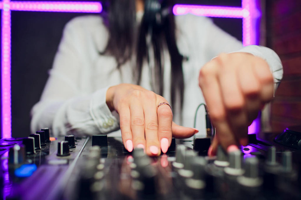 DJ playing music mixer closeup - Foto, afbeelding