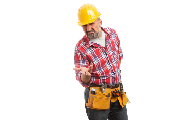 Confused constructor holding hand as doubtful concept gesture isolated on white studio background - Photo, Image