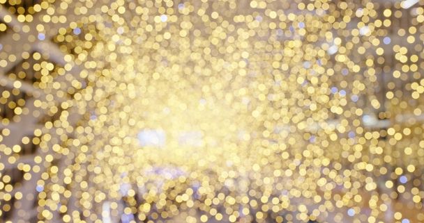 Размытое золотистое блестящее украшение золотым цветом  - Фото, изображение