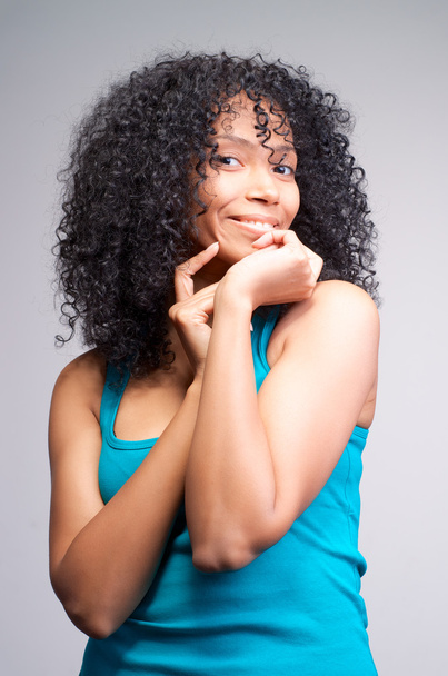 mulatto girl with dark curly hair - Фото, зображення