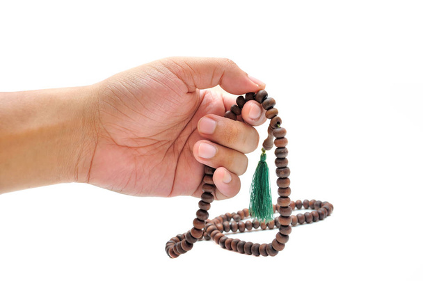 Male Hand with Rosary Isolated on White Background - Photo, image