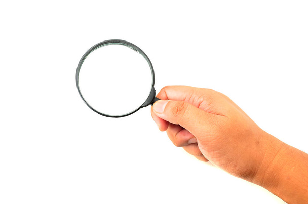 Hand holding magnifying glass - Photo, Image