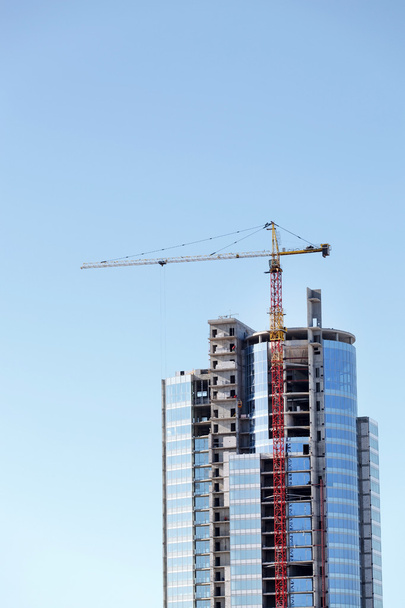 tall building under construction - Foto, Bild