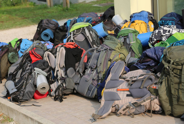 many backpacks of boys scout during the summer camp - Photo, Image