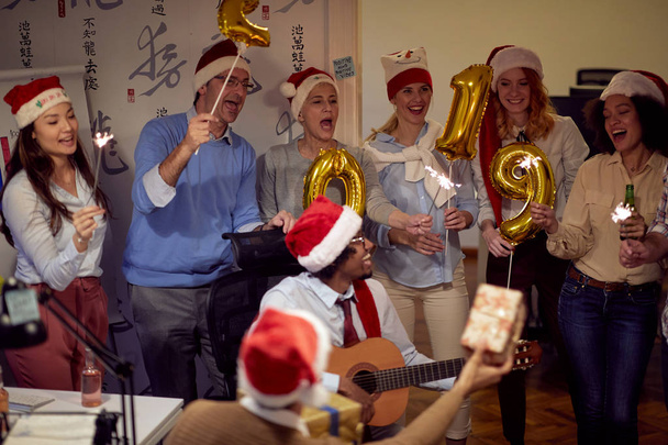 Successful business group people in Santa hat at Xmas party in offic - Photo, Image
