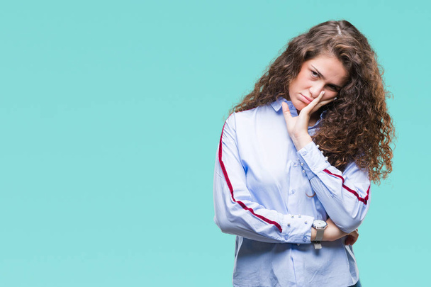 Beautiful brunette curly hair young girl wearing elgant look over isolated background thinking looking tired and bored with depression problems with crossed arms. - Photo, Image