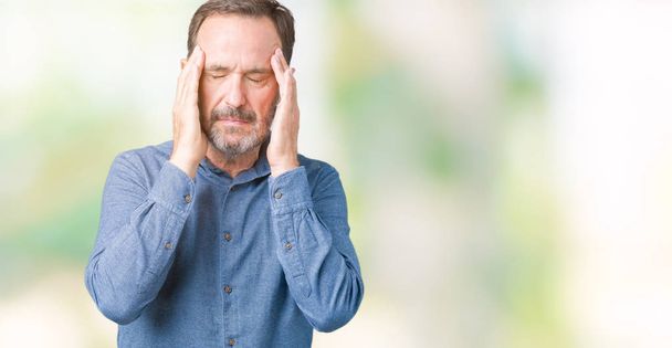 Handsome middle age elegant senior man over isolated background with hand on head for pain in head because stress. Suffering migraine. - Фото, зображення