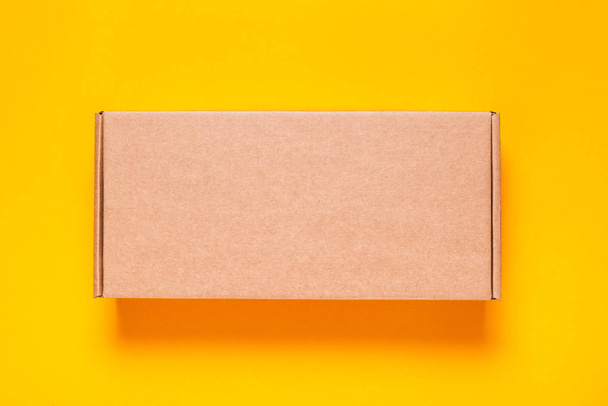 Empty new brown cardboard box - Fotoğraf, Görsel