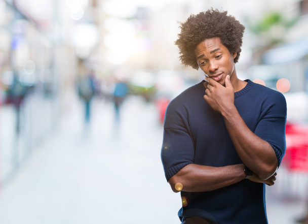 Afro american man over isolated background thinking looking tired and bored with depression problems with crossed arms. - Foto, Imagem
