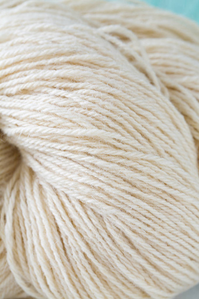 natural white wool yarn close up - Φωτογραφία, εικόνα