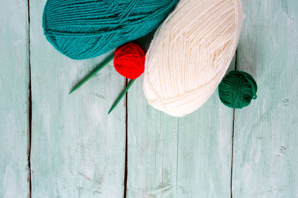knitting yarn hanks on wooden surface - Φωτογραφία, εικόνα