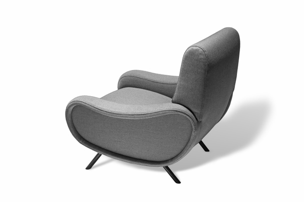 Szürke színű fotel. Modern designer szék, fehér háttér. Textil kárpitos szék - Fotó, kép