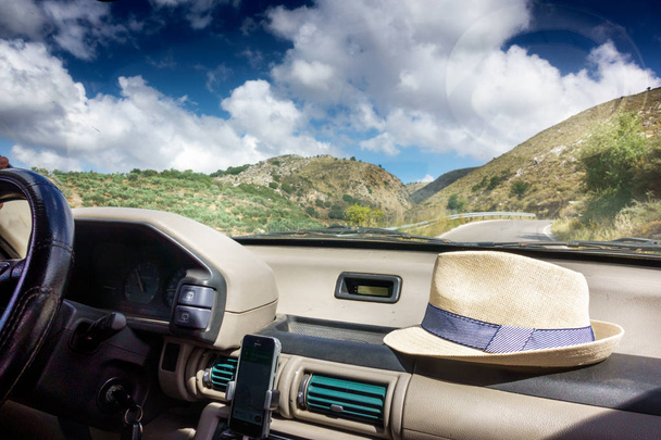 Close-up of car on road against mountains, Crete, Greece - Photo, Image