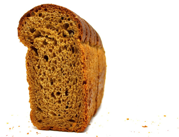 The cut loaf of bread isolated on white - Valokuva, kuva