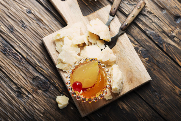 Typical mostarda di frutta of Cremona with cheese, selective focus - Fotoğraf, Görsel