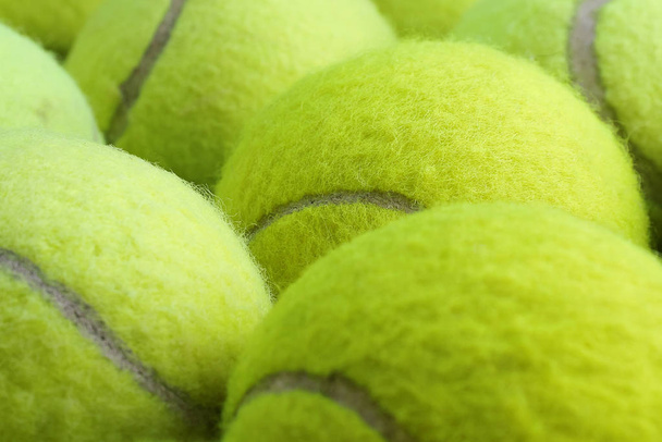 Tennis balls background. Closeup. Background - 写真・画像