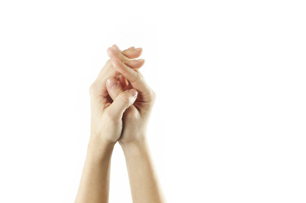 Közeli női pályázati kezek-ra egy elszigetelt fehér háttér előtt. Hagyományos címkézés. Jelek és szimbólumok - Fotó, kép