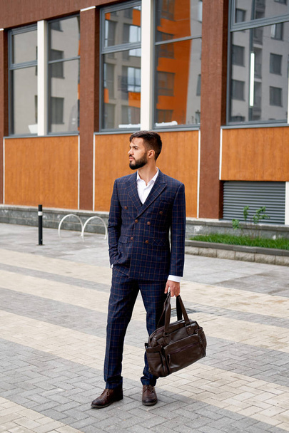Businessman style. Men style. Young businessman with bag - Photo, image