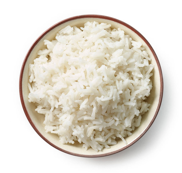 tazón de arroz hervido aislado sobre fondo blanco, vista superior
 - Foto, Imagen