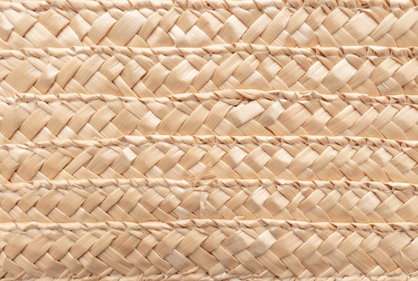 Cerrar la textura de la cesta de mimbre para su uso como fondo. Patrón de cesta tejida y textura
. - Foto, imagen