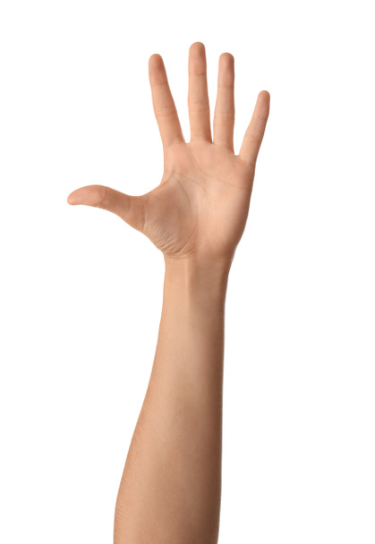 Vrouwelijke hand op witte achtergrond - Foto, afbeelding