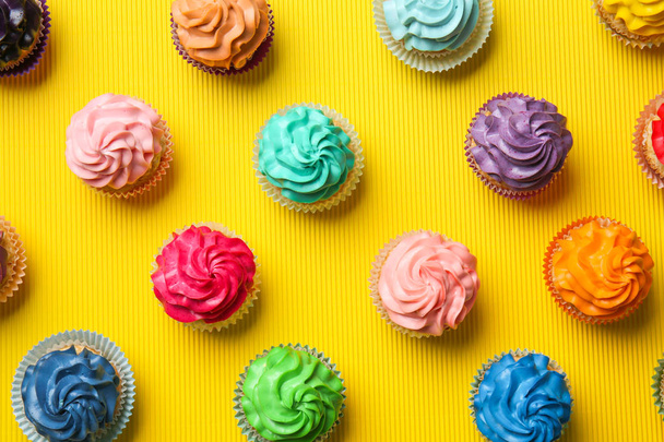 Different cupcakes on color background - Photo, Image