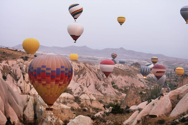 Hot Air Balloons In Sky. Colorful Flying Balloons In Nature  - Фото, изображение