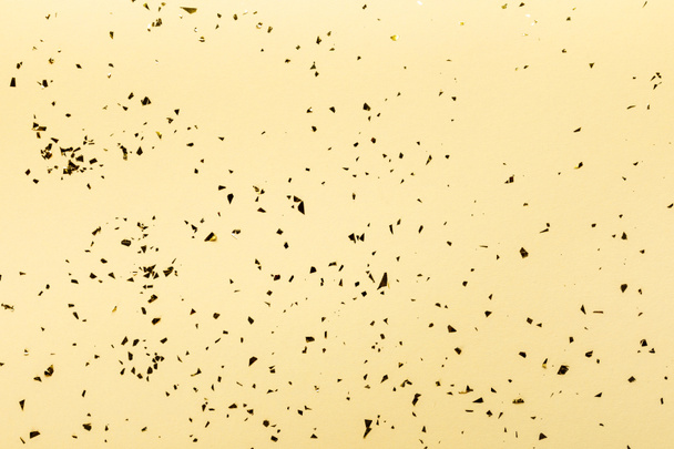 beautiful christmas background with golden festive confetti on beige  - Zdjęcie, obraz