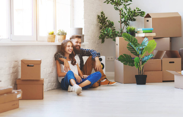a happy young married couple moves to new apartmen - Photo, Image