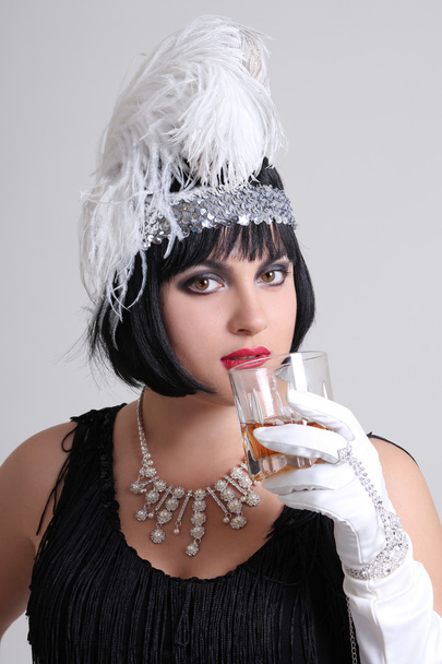 vintage actress with glass of whiskey - Фото, зображення