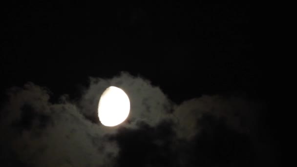 Moon with clouds moving on sky, 4k closeup video at night - Footage, Video