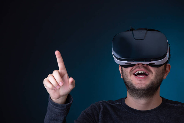 Photo of happy man in virtual reality glasses - Foto, imagen