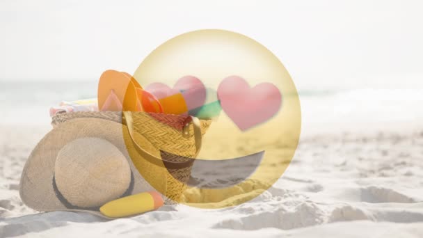 Animated Yellow Emoticon with hearts against woman enjoying the beach and laying in the sand background - Video