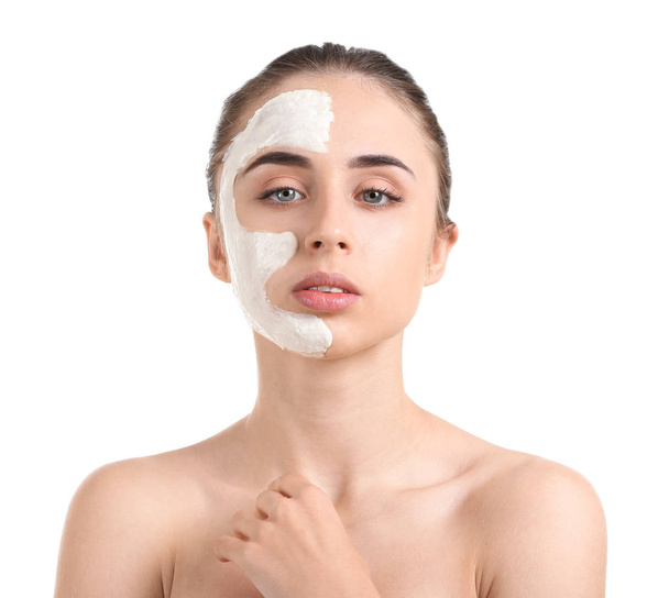 Beautiful young woman with facial mask on white background - Fotoğraf, Görsel