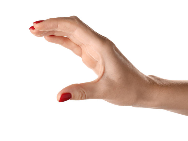 weibliche Hand mit Maniküre auf weißem Hintergrund - Foto, Bild