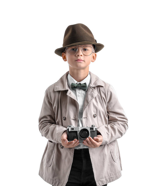 Cute little detective with photo camera on white background - Foto, imagen