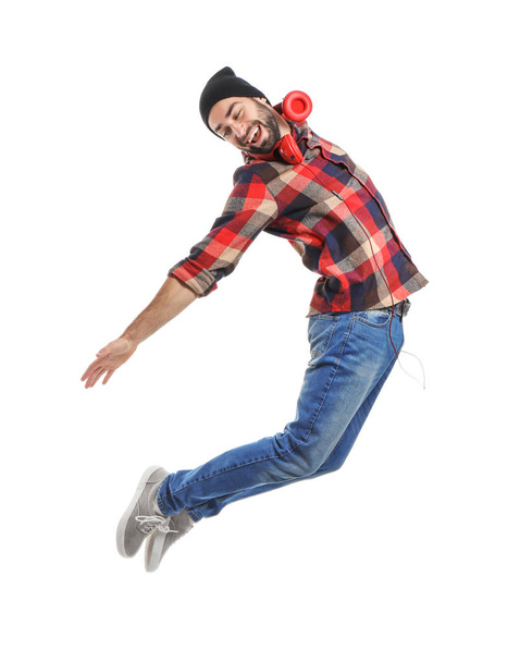 白い背景の男性ダンサーをジャンプ - 写真・画像