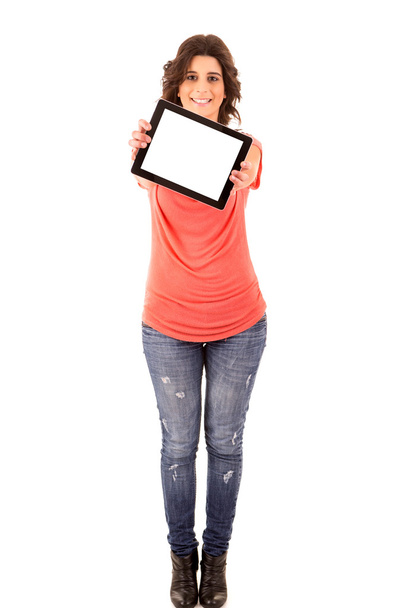 Happy young woman presenting a tablet computer - Zdjęcie, obraz