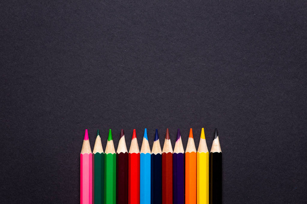 Colorful Pencils on Black Background - Photo, Image