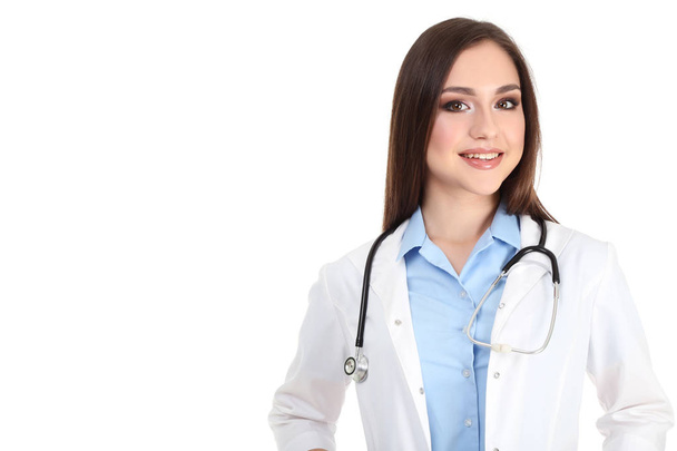 Portrait of young doctor with stethoscope on white background - Zdjęcie, obraz