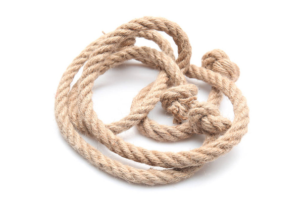 Прокатана мотузка на білому тлі
 - Фото, зображення