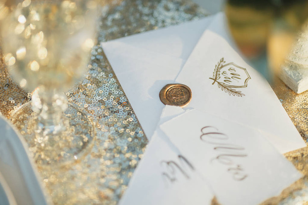 Wedding card design. Postal card design. Sealing wax stamp. Golden background. - Photo, Image